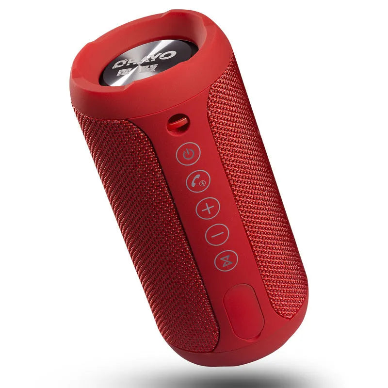Black waterproof portable Bluetooth speaker with buttons for TF card, AUX, and Bluetooth playback.