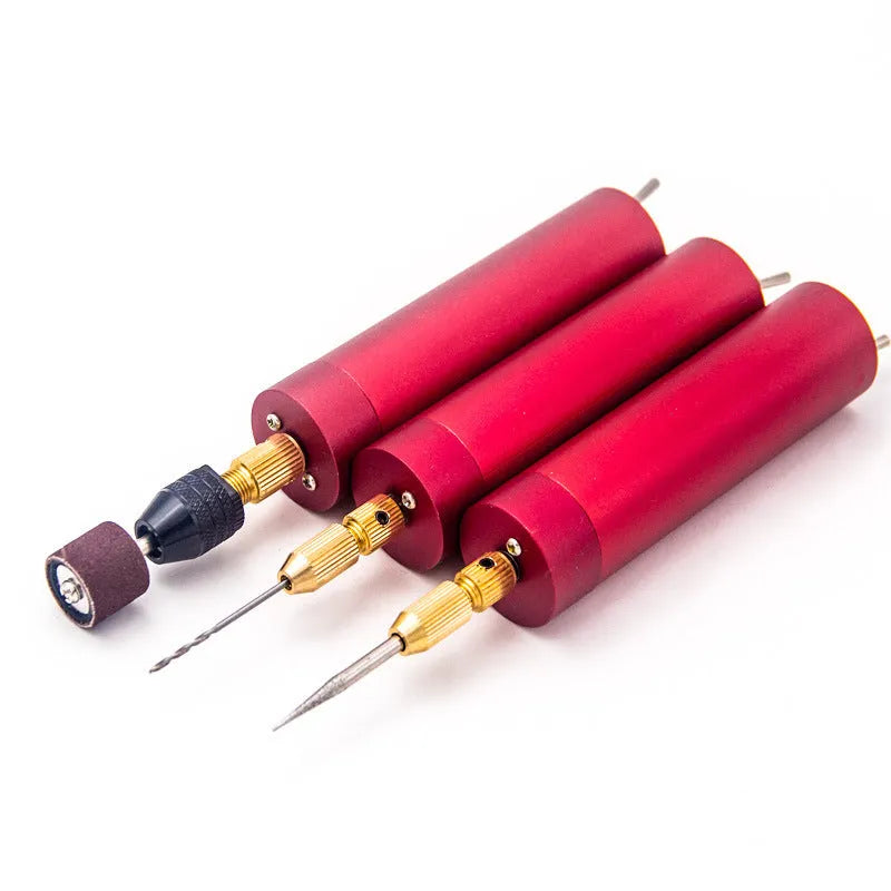 Micro USB electric grinder tool kit with three small drill bits on a white background.