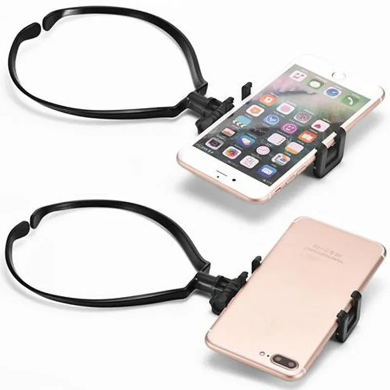 Black wearable phone holder with flexible neck ring shown in use as a hands-free smartphone mount.