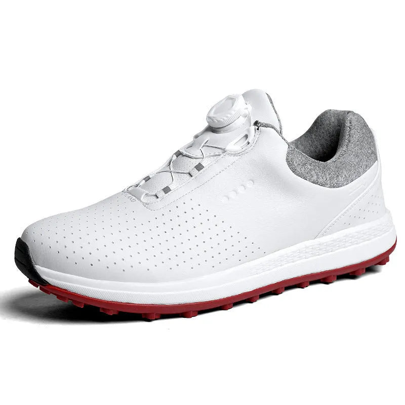 Men's white and black casual low-top golf shoes with breathable hollow-out design and non-slip sole.