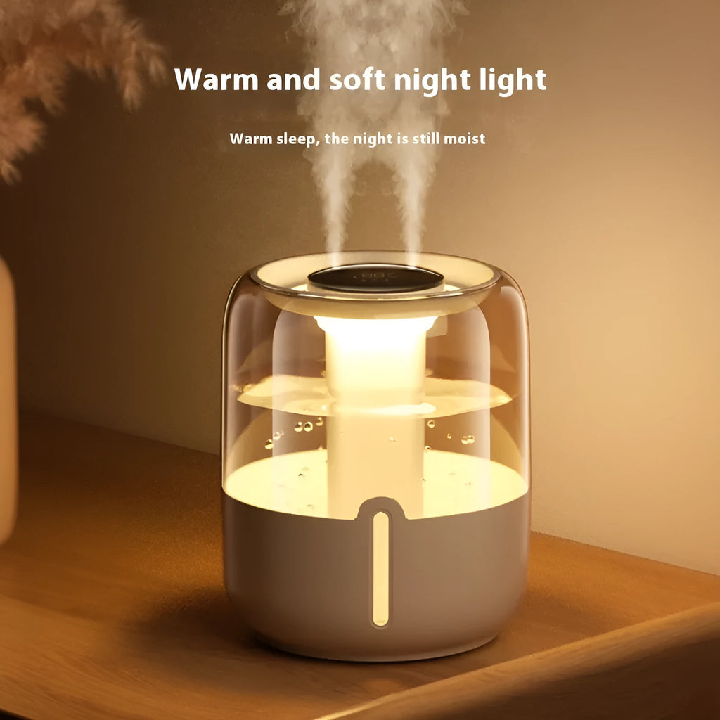 Beige round USB humidifier with display screen and dual mist outlets on a table
