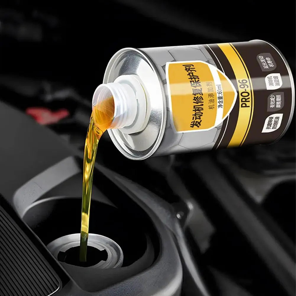 White-capped 60ml bottle of engine oil anti-wear additive on a plain background.