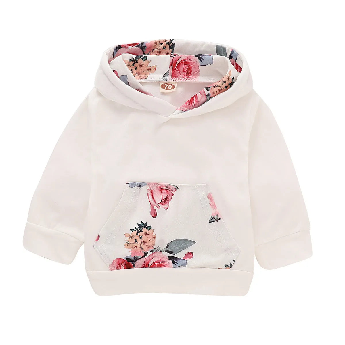 White cotton hooded pantsuit for a baby girl on a hanger, showing long sleeves and full-length trousers.