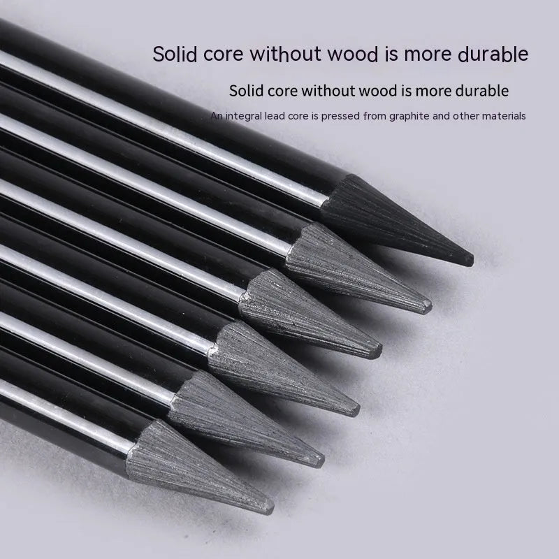 Set of nine graphite and carbonised drawing pencils in wooden casings on a suction card.