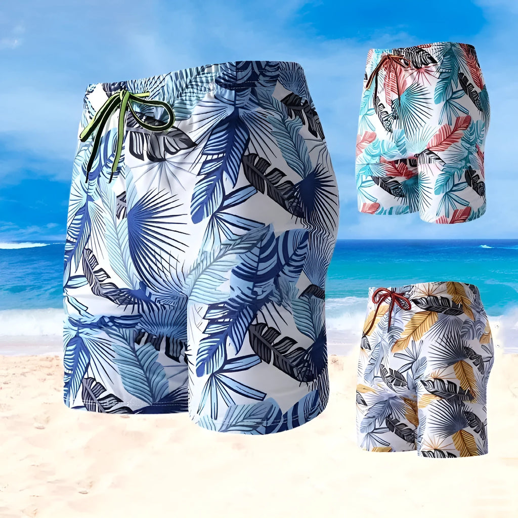 Men's blue leaf pattern cropped swimming trunks with polyester spandex fabric