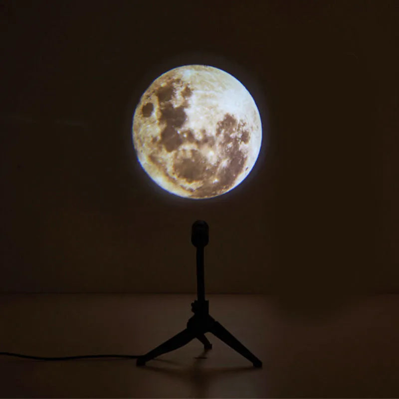 2 in 1 Earth and Moon star projector lamp with adjustable hose bracket on a table