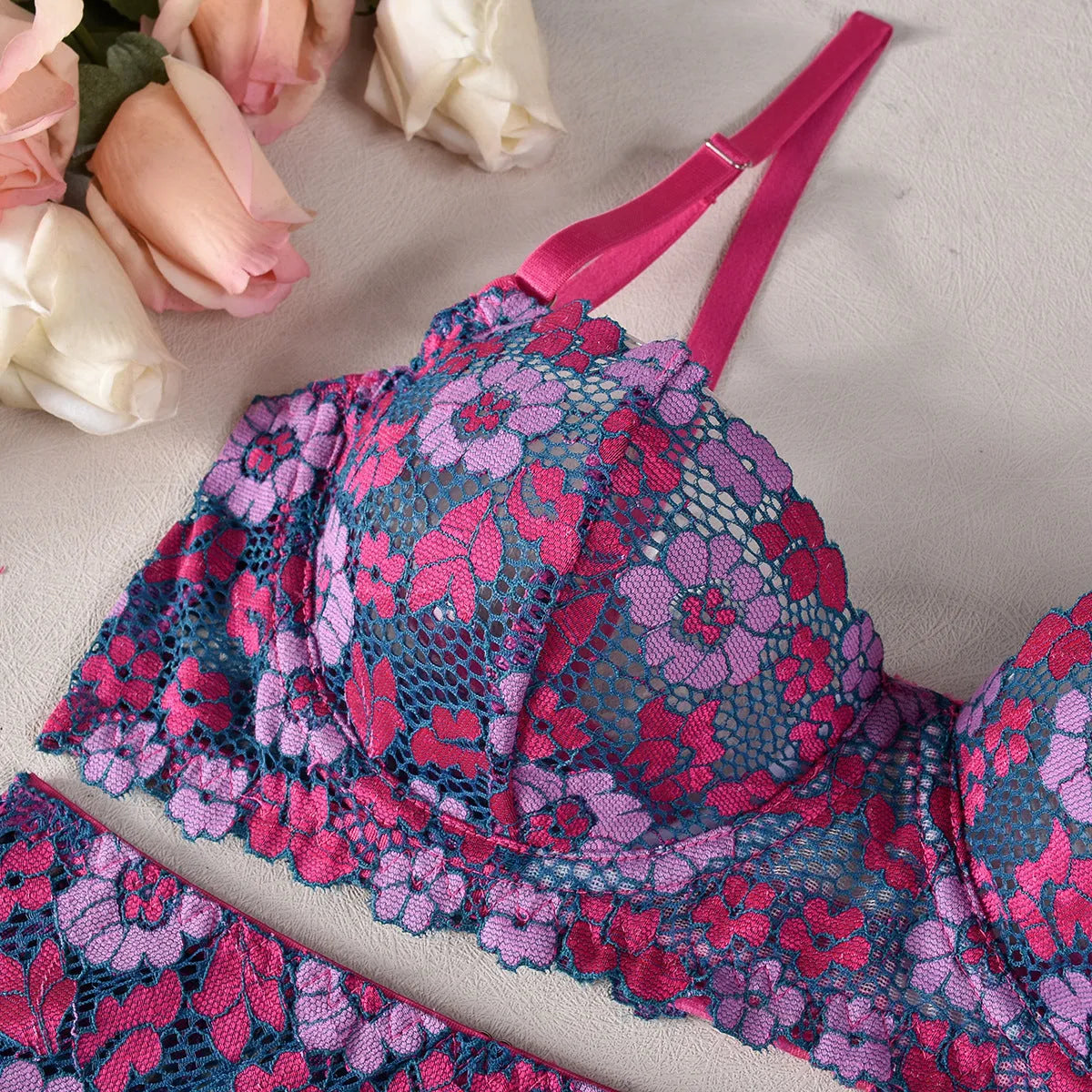 Women's rose red embroidered bikini set with contrast colour design on polyester fabric