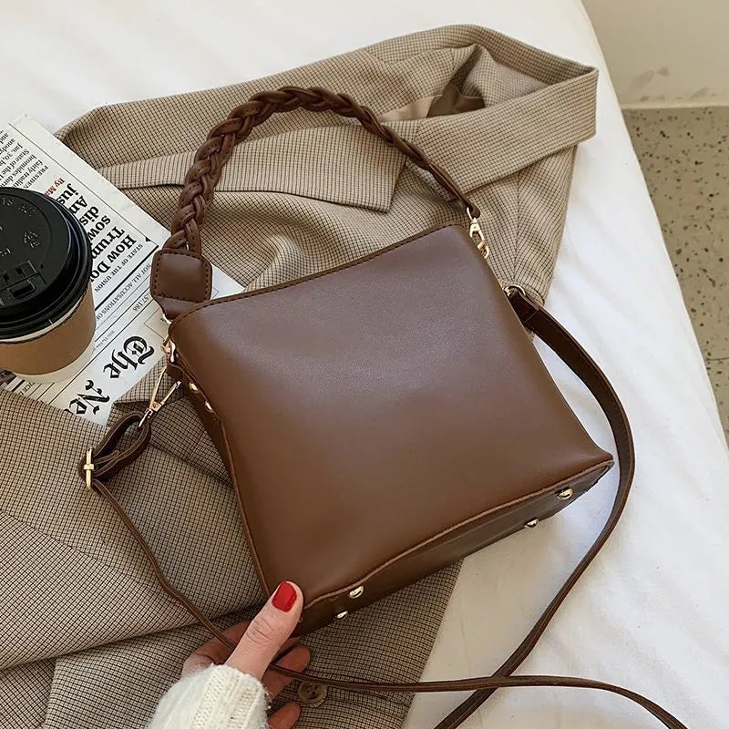 Retro woven PU leather one-shoulder crossbody underarm bucket bag in khaki colour.