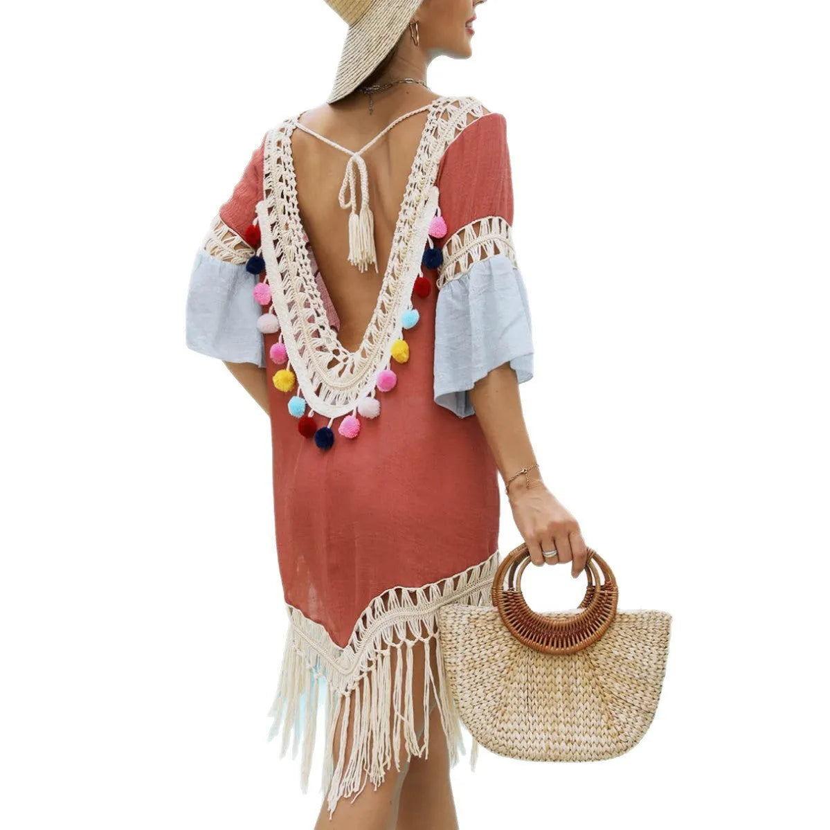 Orange hand-crocheted bamboo cotton beach overskirt with tassel trim and matching floral blouse