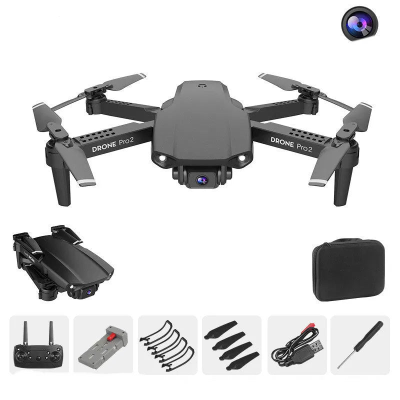 E99Pro2 folding dual camera drone black with propellers on table