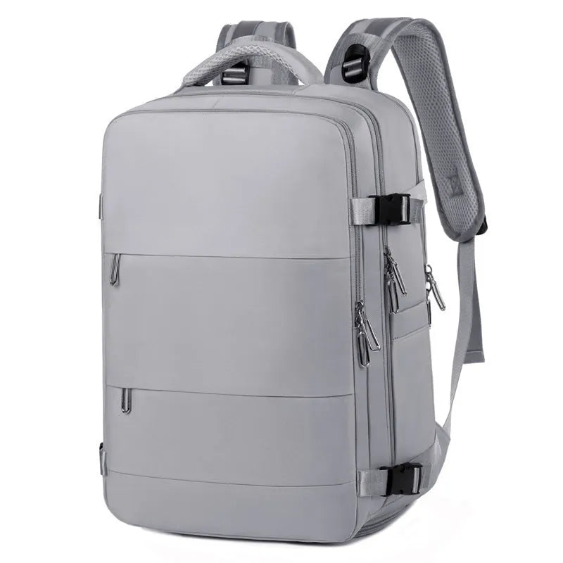Large purple travel backpack with laptop compartment and air pillow shoulder straps shown open to reveal internal organisation pockets.