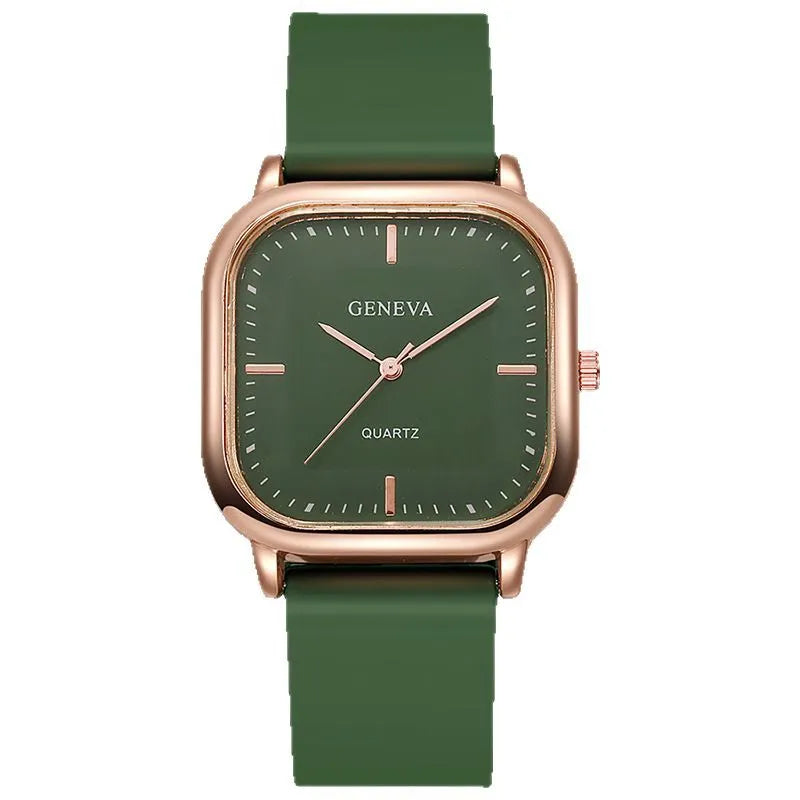 Women's rose gold square dial quartz watch with plastic strap on white background