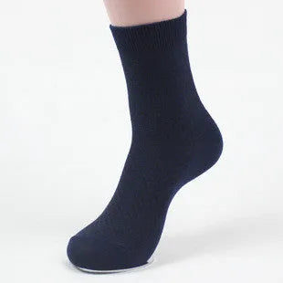Pair of men's bamboo fibre business socks with small square pattern, shown in navy blue.