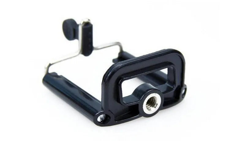 Compact mini desktop tripod with extendable aluminium legs and a black U-shaped phone clip attached.