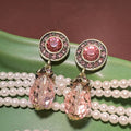 Pair of high-grade crystal zircon drop earrings in green and pink with glossy glass glaze finish