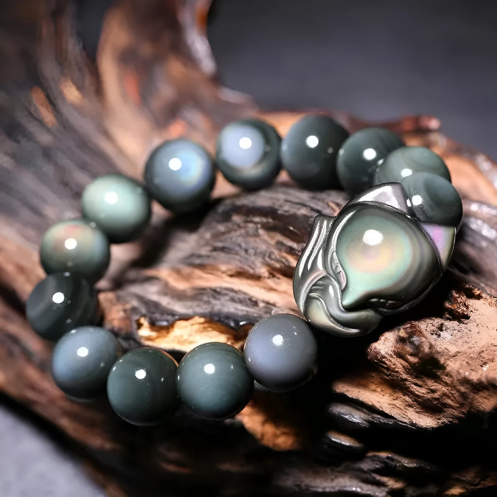 Obsidian carved fox couple bracelet showing animal zodiac design in cartoon style