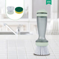 Pot and dish brush with integrated soap dispenser and replaceable brush head in mint green