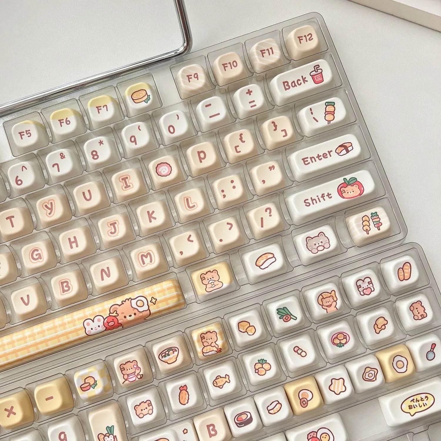 Rabbit Bear Restaurant themed PBT keycap set with EOA height profile, showing 140 colourful keycaps with sublimated designs.