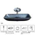 Blue grey tempered glass bathroom table basin with simple design on a vanity.