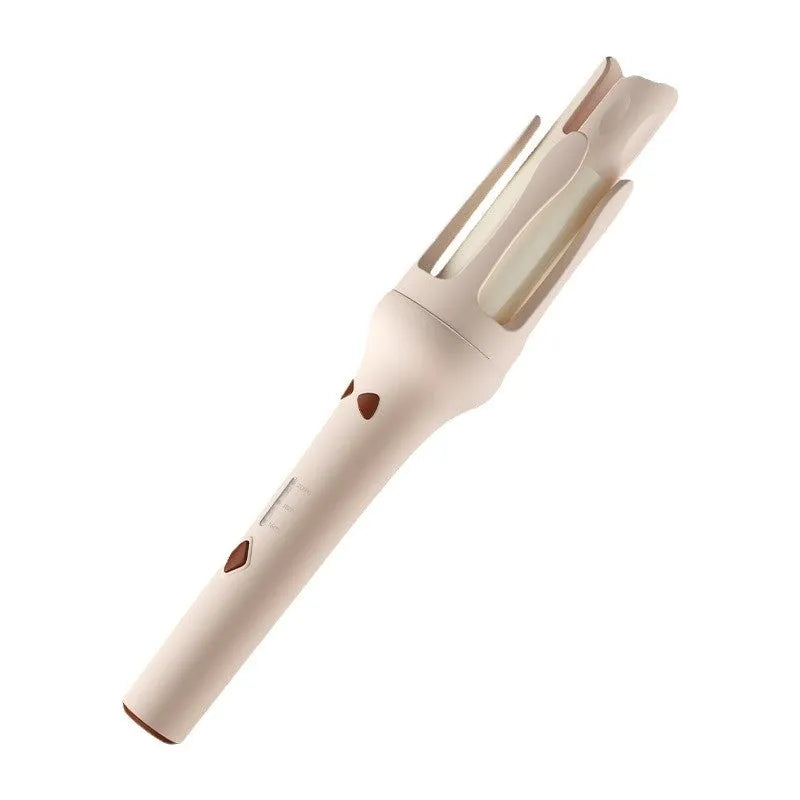 White and Chigo brand automatic hair curler with a 32mm barrel on a table.