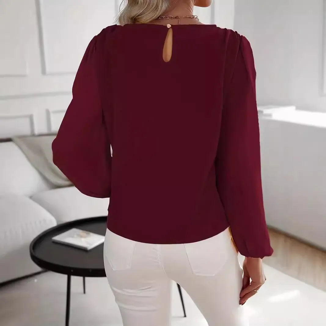 Solid colour women's round neck long sleeve top in wine red with button detail