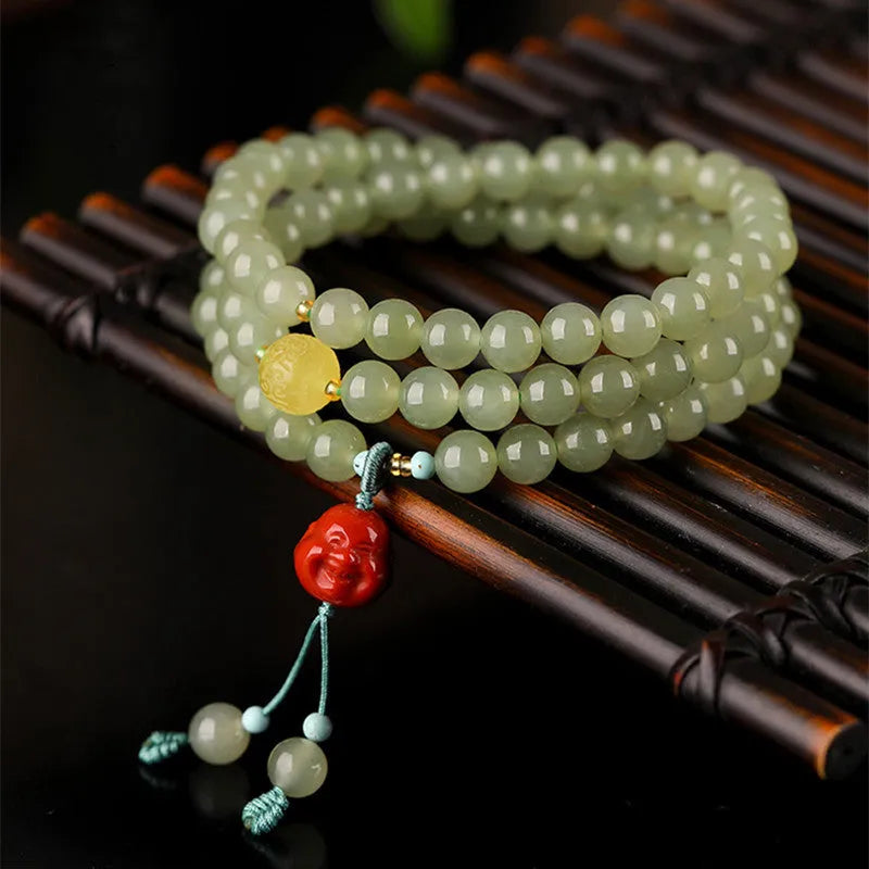 Pale blue Hetian jade bracelet with three circle design on wrist
