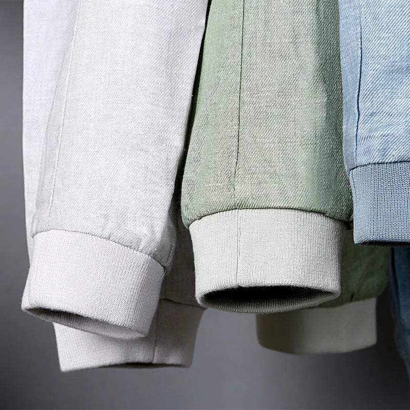 Men's thin cotton linen jacket in blue, displayed on a hanger