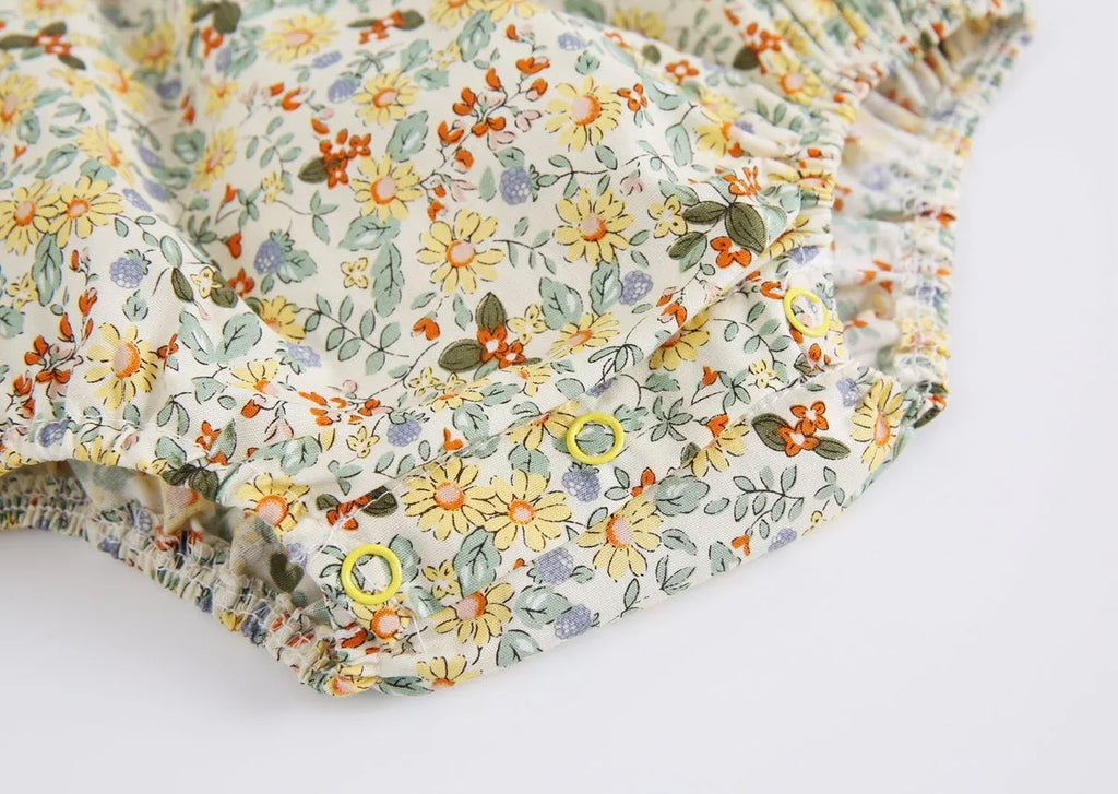 Yellow floral cotton baby romper with doll collar for girls, triangle jumpsuit style