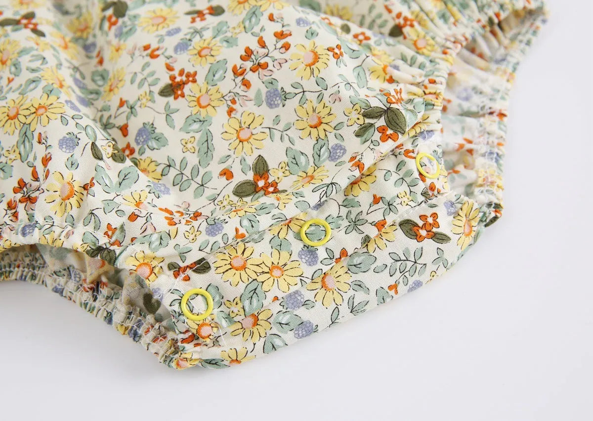 Yellow floral cotton baby romper with doll collar for girls, triangle jumpsuit style