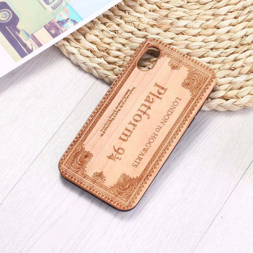 Wooden iPhone case with laser-carved cartoon animal design and TPU bumper in rosewood colour.
