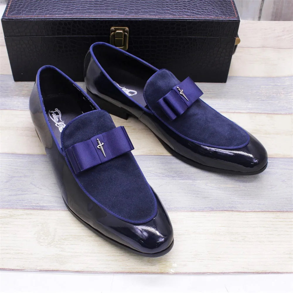 Men's low-top patent leather shoes in black with a tassel detail and rubber sole.