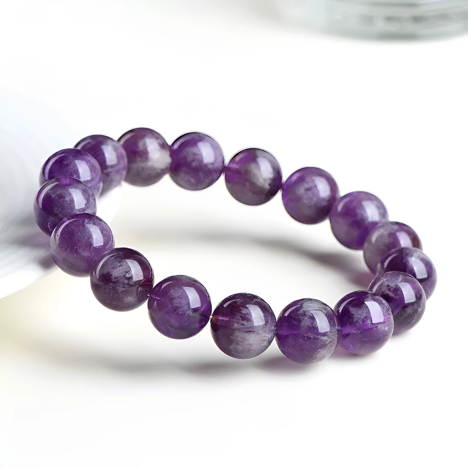 Natural feather Amethyst Snow Mountain purple crystal bracelet with geometric beads and Ruyi element.