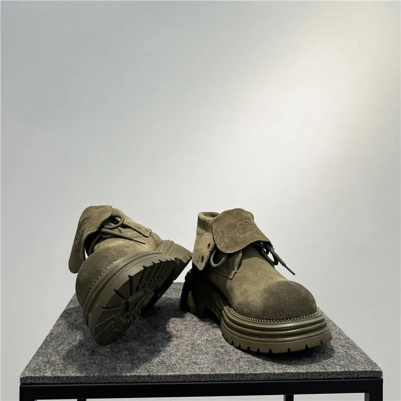 Retro distressed cow suede worker boots with thick soles in camel colour.
