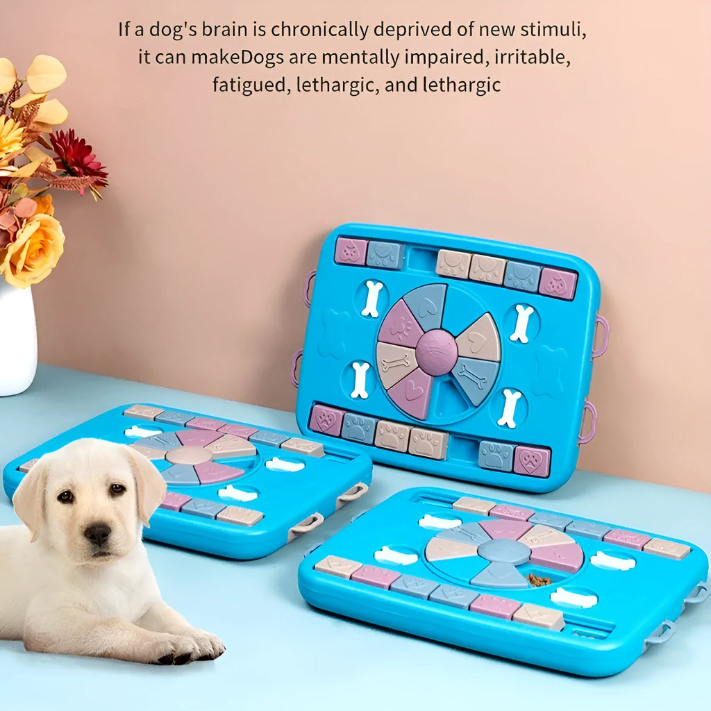 Blue plastic interactive dog puzzle feeder with sliding panel and four corner handles on a non-slip base