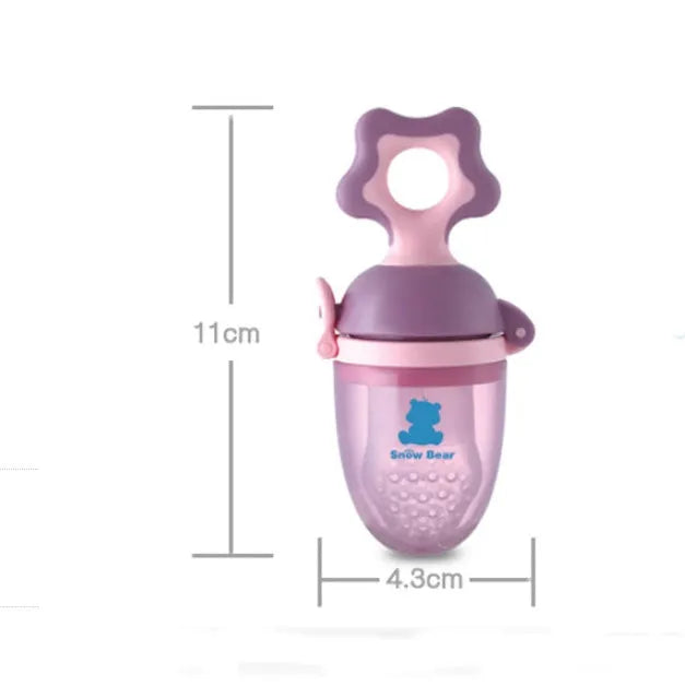 Green and purple polypropylene baby bite trainer with textured surface and easy-grip handle