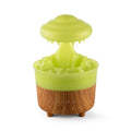 Wood grain white rain cloud shaped humidifier diffuser with LED night light on a table.