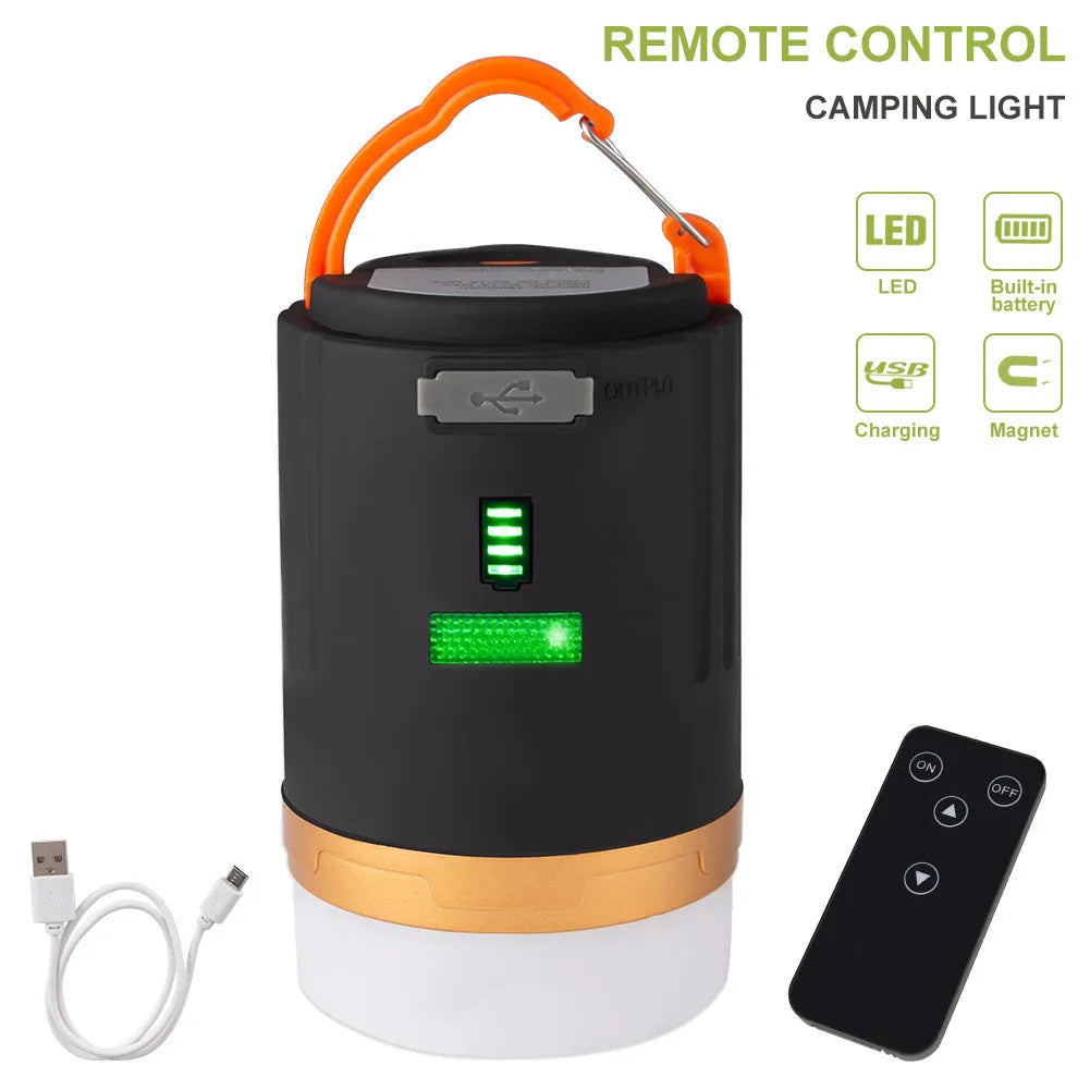 Black rechargeable IPX6 LED camping light with remote control, hanging hook and top magnet on white background