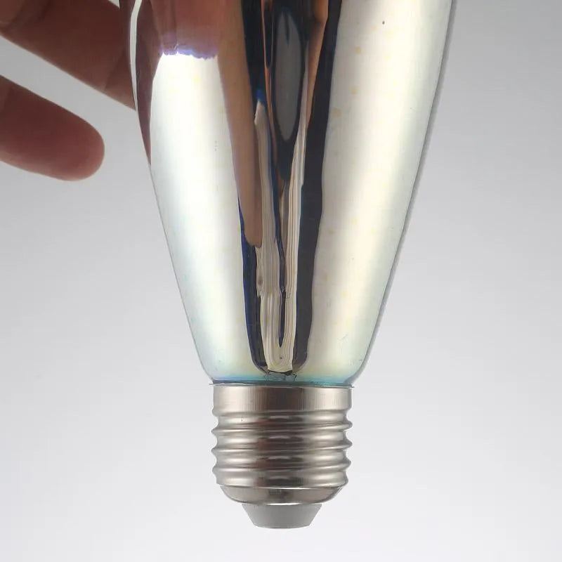 3D projection LED decoration bulb casting a firework pattern on a wall