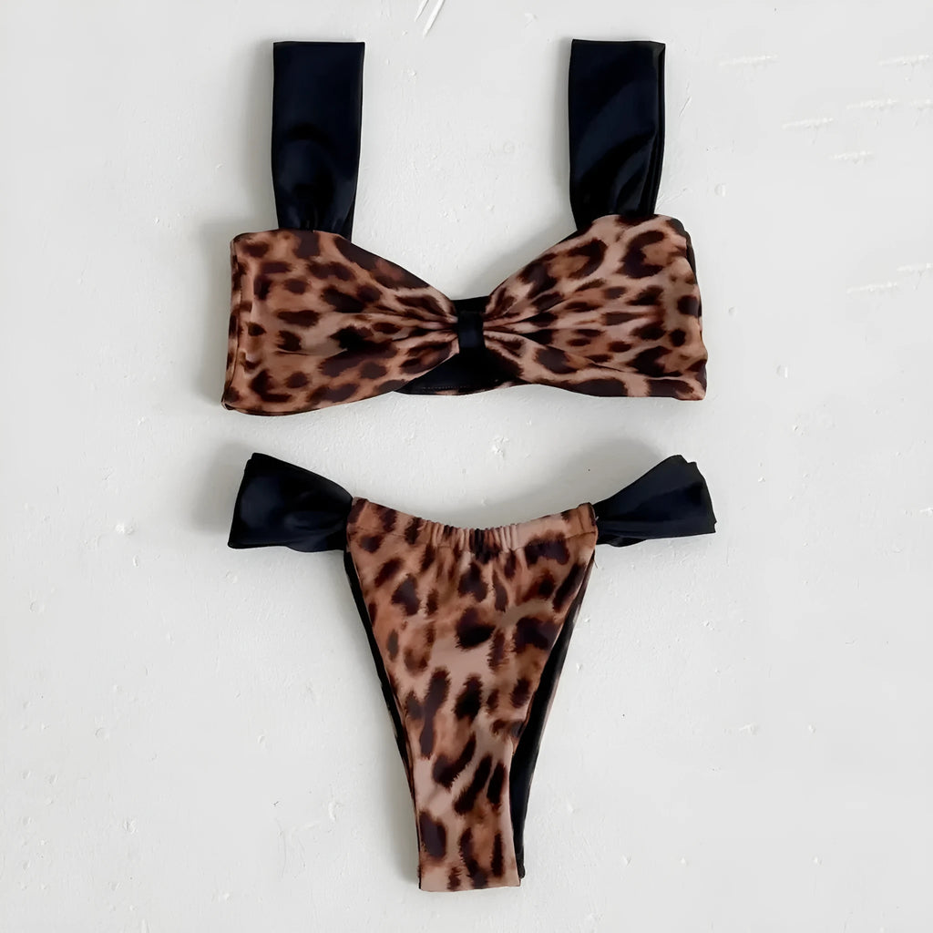 Women's leopard print bikini set with sleeveless tube top and matching swimsuit bottoms.