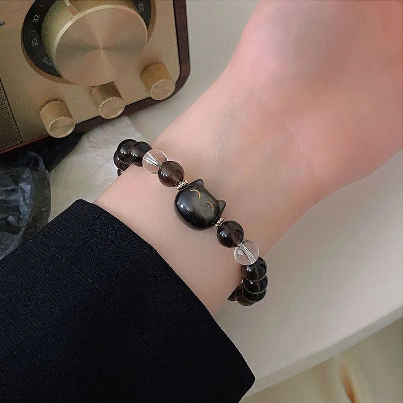 Women's silver bracelet with 8mm natural opal stone and cat head motif design