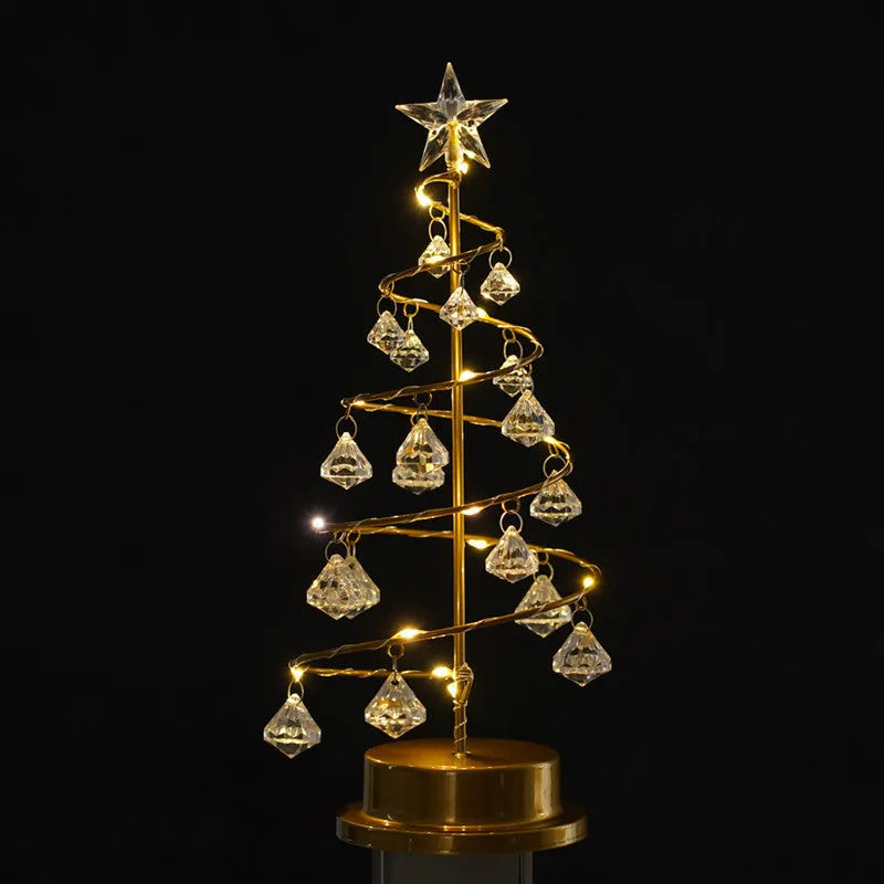 Gold crystal Christmas tree LED light with warm glow, star topper, 33cm tall, on a tabletop