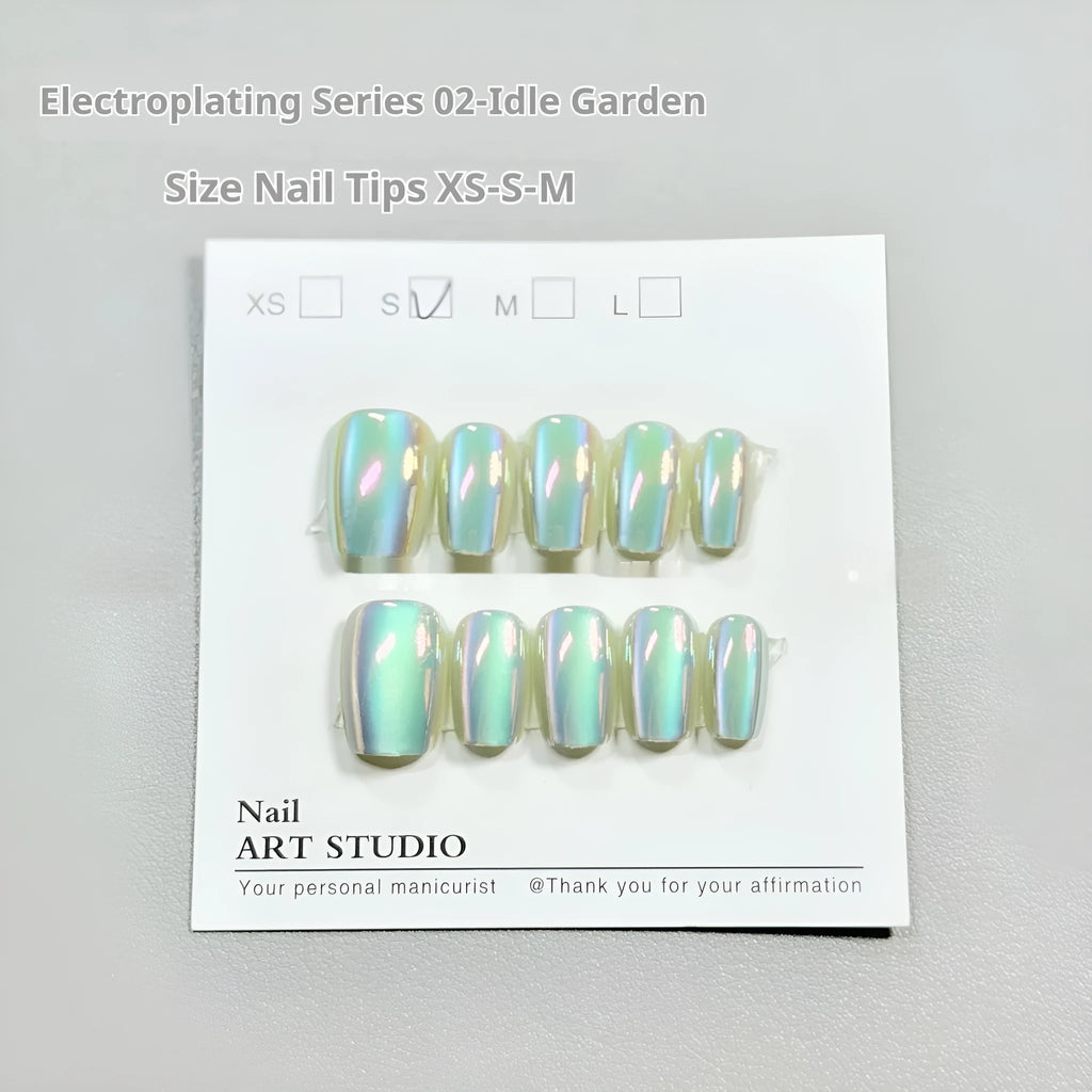 Electroplated Cat's Eye aurora effect false nail set in short ladder sizes on a display card.