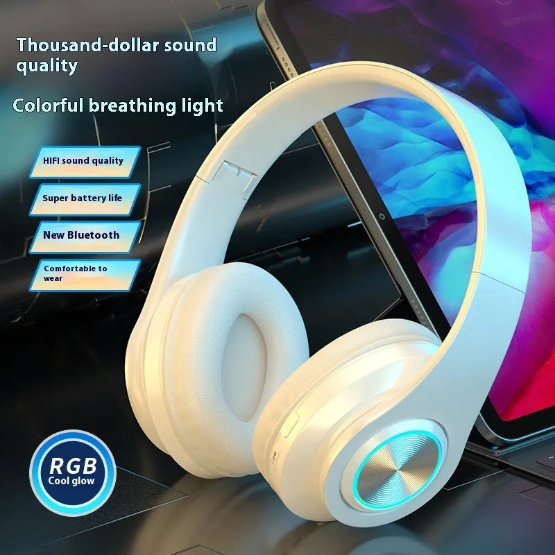 Black wireless over-ear Bluetooth gaming headset with LED breathing lights on the earcups.
