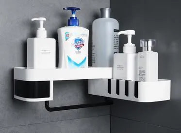 White and black retro European style corner shelf with suction mount on a bathroom wall.