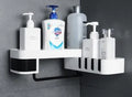 White and black retro European style corner shelf with suction mount on a bathroom wall.