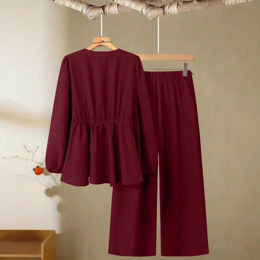 Women's polyester two-piece suit in khaki with long sleeves, button detailing, and matching trousers