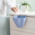 Nordic coloured cabinet rubbish bin in grey, pink, and blue options showing compact 21×16×14cm dimensions