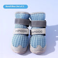 Cartoon style blue and green PU dog shoes for summer, showing wear-resistant soles.