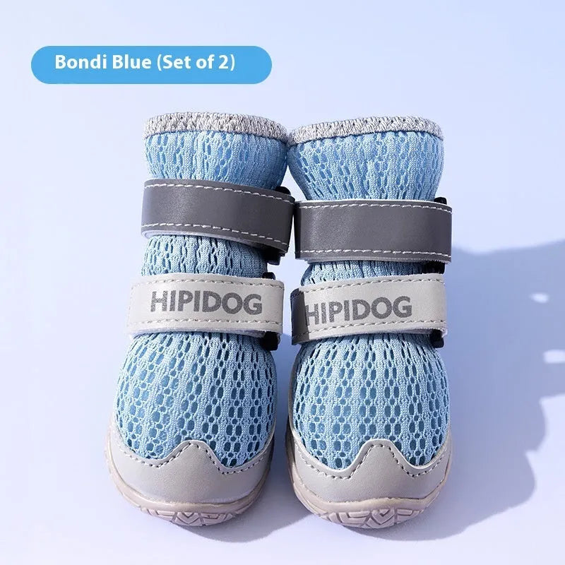 Cartoon style blue and green PU dog shoes for summer, showing wear-resistant soles.