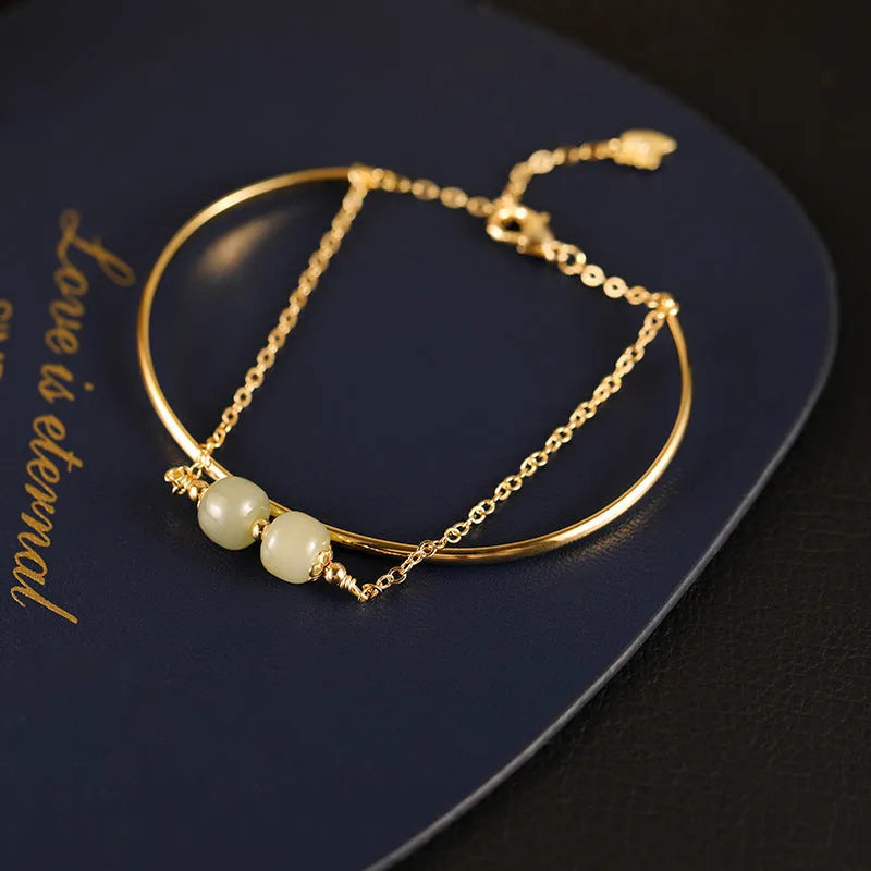 Women's jade lucky beads bracelet with gold inlay treatment showing single, double, and three beads versions